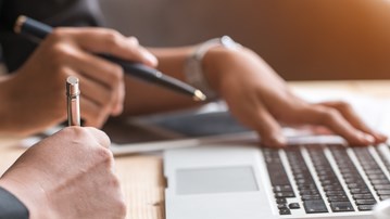 hands and a computer
